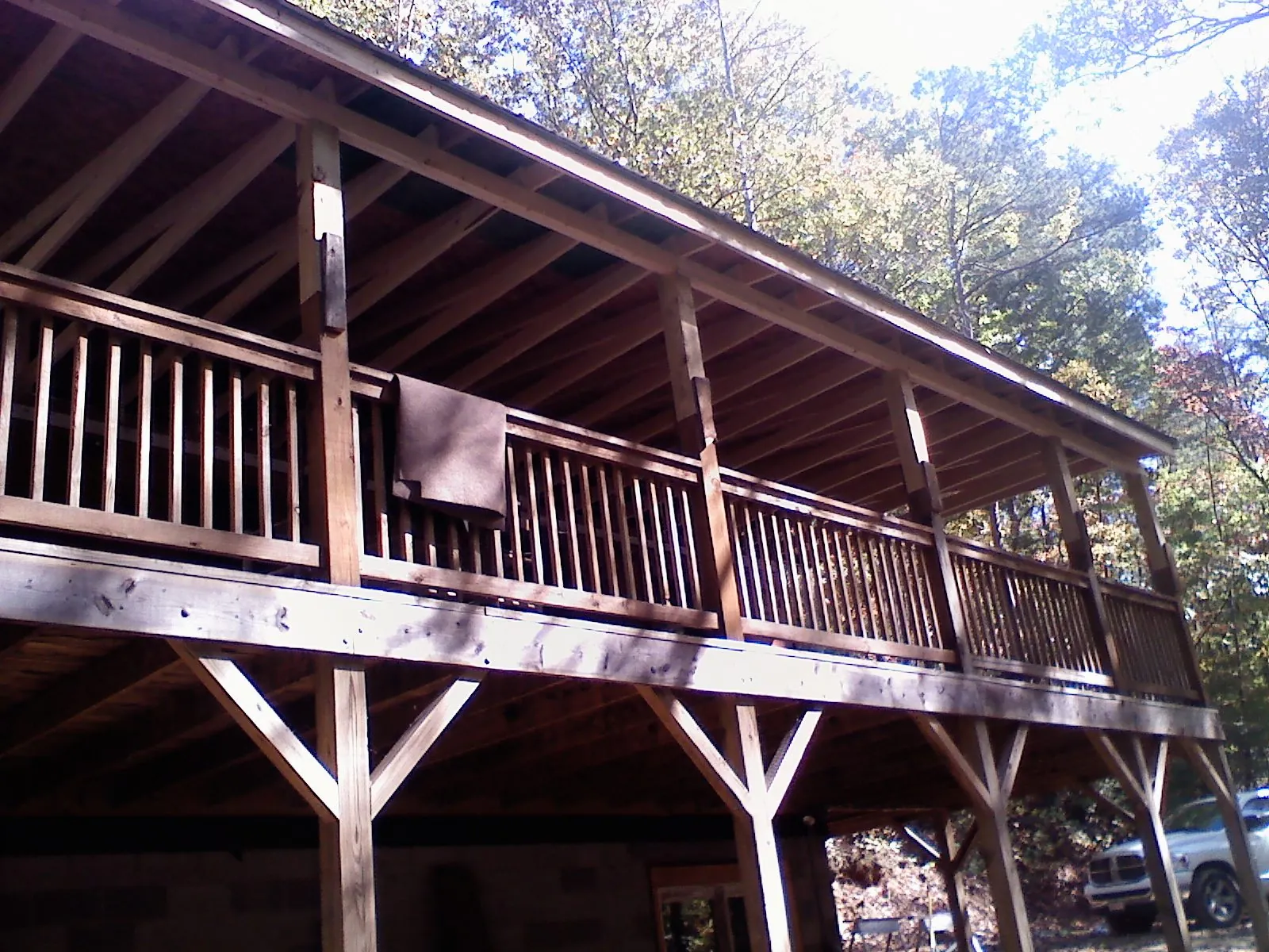 Timber framing under a new elevated porch and deck — Roof Leak Repair in Fairfax by Roofing Brothers